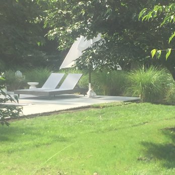 English Gardens & Designs - Seagrass around pool - Landscaping Near Me English Gardens & Designs - Seagrass around pool - Landscaping Near Me