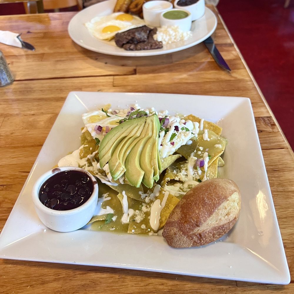 Frontera Sur - Chilaquiles verde...steak, eggs, and plantains in the distance. - Breakfast & Brunch Near Me - Portland, Oregon Frontera Sur - Chilaquiles verde...steak, eggs, and plantains in the distance. - Breakfast & Brunch Near Me - Portland, Oregon