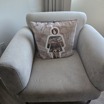 Hotel Zena - Chair in room with Sonia Sotomayor throw pillow - Hotels Near Me - Washington, DC, District of Columbia