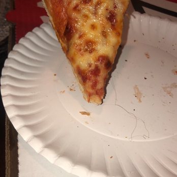 Mama Pepino's Pizza - a slice of pizza on a paper plate - Pizza Near Me - Elizabeth, Pennsylvania Mama Pepino's Pizza - a slice of pizza on a paper plate - Pizza Near Me - Elizabeth, Pennsylvania