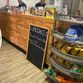 Kathy's Deli & Salads - a man standing in front of the counter - Salad Near Me - Glendale, Arizona