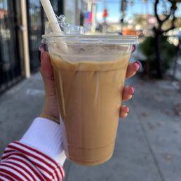 Iced vanilla latte with oatmilk