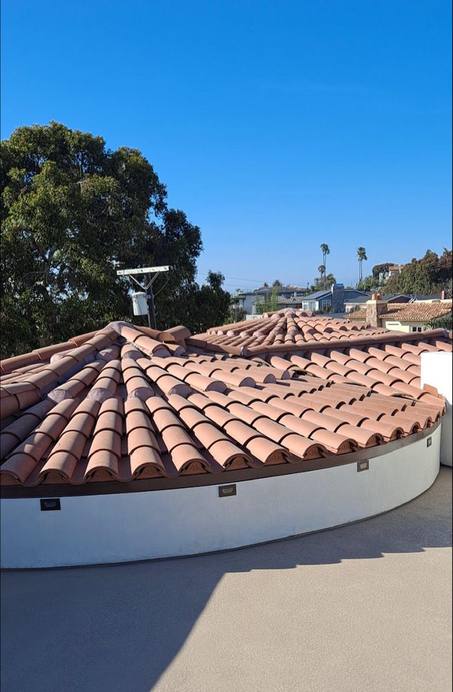 Slide of Midas Roofing