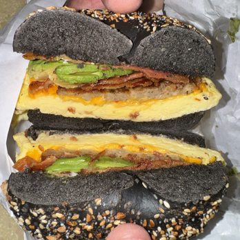 Bageloo - Squid ink everything bagel sandwich with bacon, egg, cheese, sausage and avocado 7.8/10 - Bagels Near Me - Pasadena, California