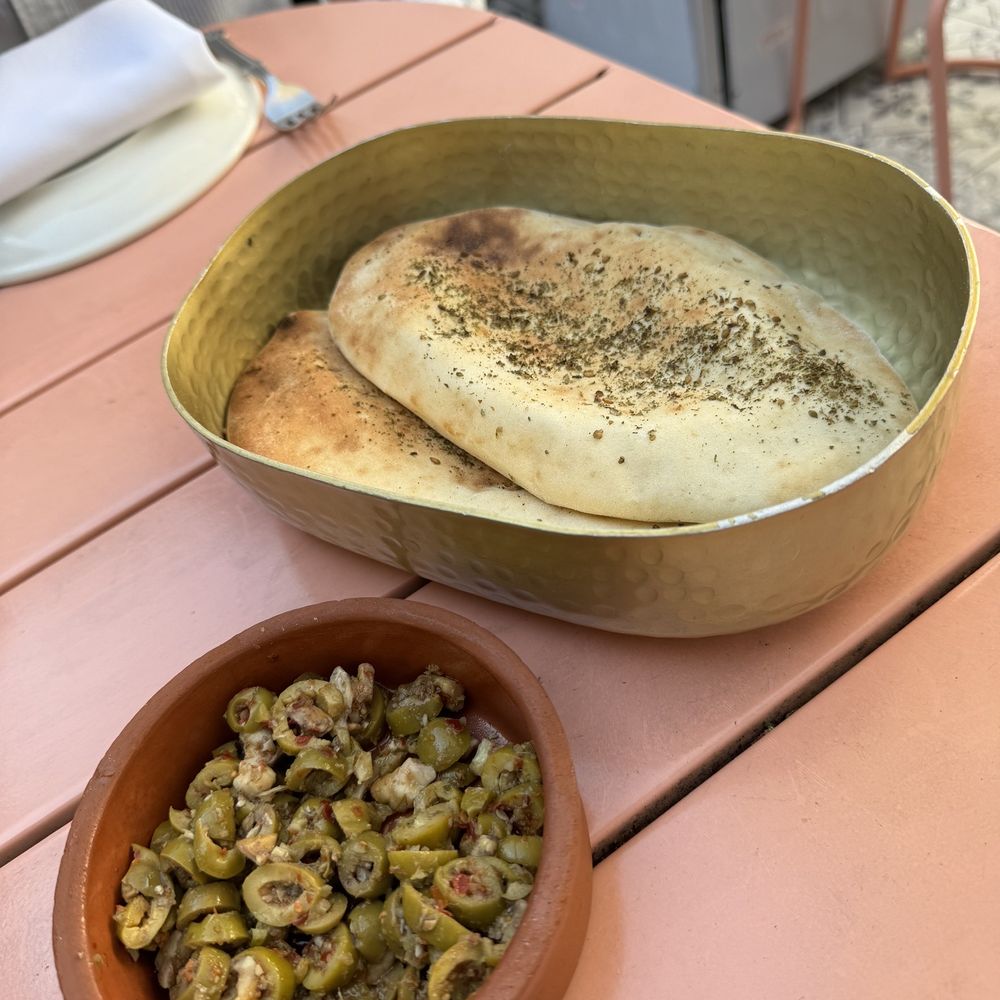 Villa Yara - Warm bread and olives - Mediterranean Near Me - Washington, DC, District of Columbia Villa Yara - Warm bread and olives - Mediterranean Near Me - Washington, DC, District of Columbia