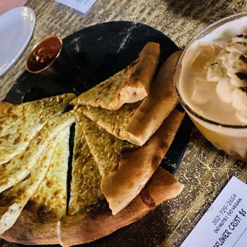 Back Porch Pizza Bar - Their "Don't Stand So Close to Me" garlic bread is like a cheese pizza - Cocktail Bars Near Me - Mount Dora, Florida