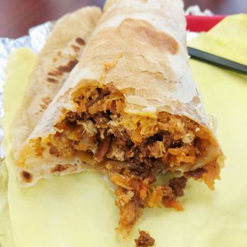 Rolbertos Mexican Food - Closeup of chori-bacon burrito (rice substituted instead of potatoes) - Mexican Near Me - Wendover, Utah Rolbertos Mexican Food - Closeup of chori-bacon burrito (rice substituted instead of potatoes) - Mexican Near Me - Wendover, Utah