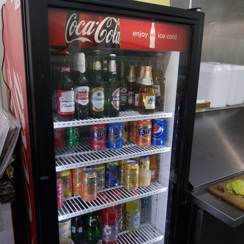 Los Laureles Supermarket - a refrigerator full of drinks - Grocery Near Me - Miami, Florida Los Laureles Supermarket - a refrigerator full of drinks - Grocery Near Me - Miami, Florida