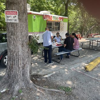 Bombay Dhaba - a group of people sitting at a picnic table - Food Trucks Near Me - Austin, Texas Bombay Dhaba - a group of people sitting at a picnic table - Food Trucks Near Me - Austin, Texas