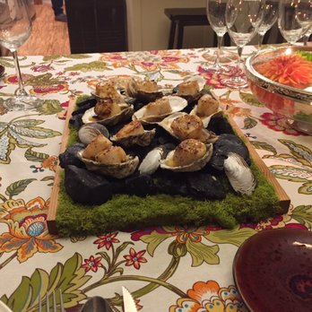 The Everyday Chef - Browned butter scallops served on petrified wood nestled in clean oyster shells - Personal Chefs Near Me