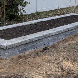Sycamore Landscapes - 1 of 3 identical planters built by Sycamore Landscapes. They added soil to the lawn area and reseeded when the project was completed.