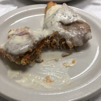 La Villa Mexican Grill - One of the loaded tamales cut in half for your viewing pleasure - Mexican Near Me - Valrico, Florida