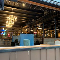 Fat Eddie's - Sitting outside on balcony looking inside the Open air window.