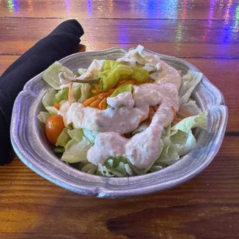 Little Red Barn Steak House - As soon as I sat down, server brought me a chilled garden salad and left a pourer of dressing. - Steakhouses Near Me - San Antonio, Texas