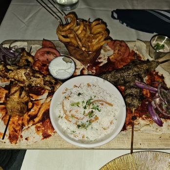 Arabian Nights - a platter of food on a table - Middle Eastern Near Me - Fort Lauderdale, Florida Arabian Nights - a platter of food on a table - Middle Eastern Near Me - Fort Lauderdale, Florida