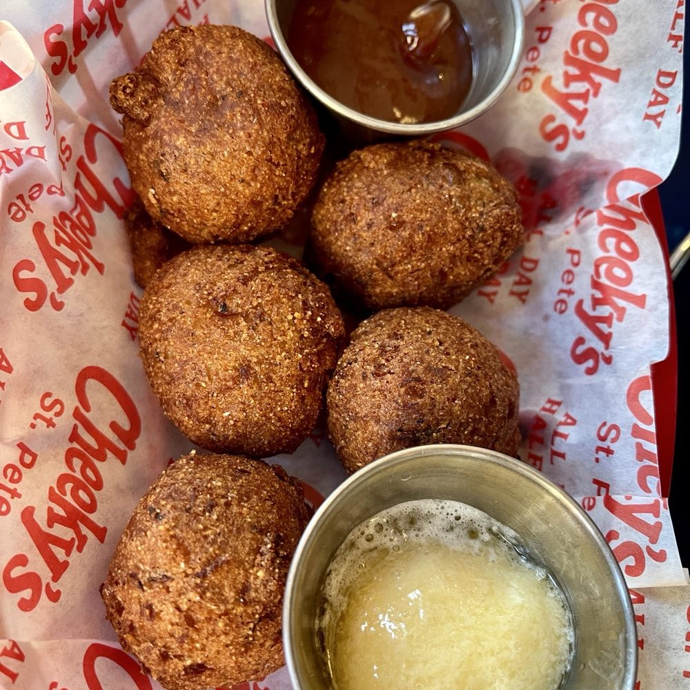 Cheeky's - Cornbread hush butters with guava jelly - Seafood Near Me - St. Petersburg, Florida