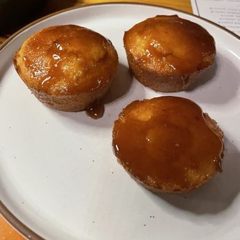 Bushell’s Kitchen & Cocktails - Cornbread muffins with butter - Cocktail Bars Near Me - Traverse City, Michigan Bushell’s Kitchen & Cocktails - Cornbread muffins with butter - Cocktail Bars Near Me - Traverse City, Michigan