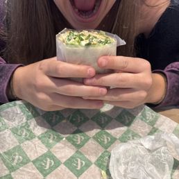 Mediterranean crunch wrap and my beautiful face eating it