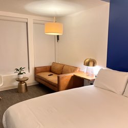 Skyfall Guestrooms - Bed and couch