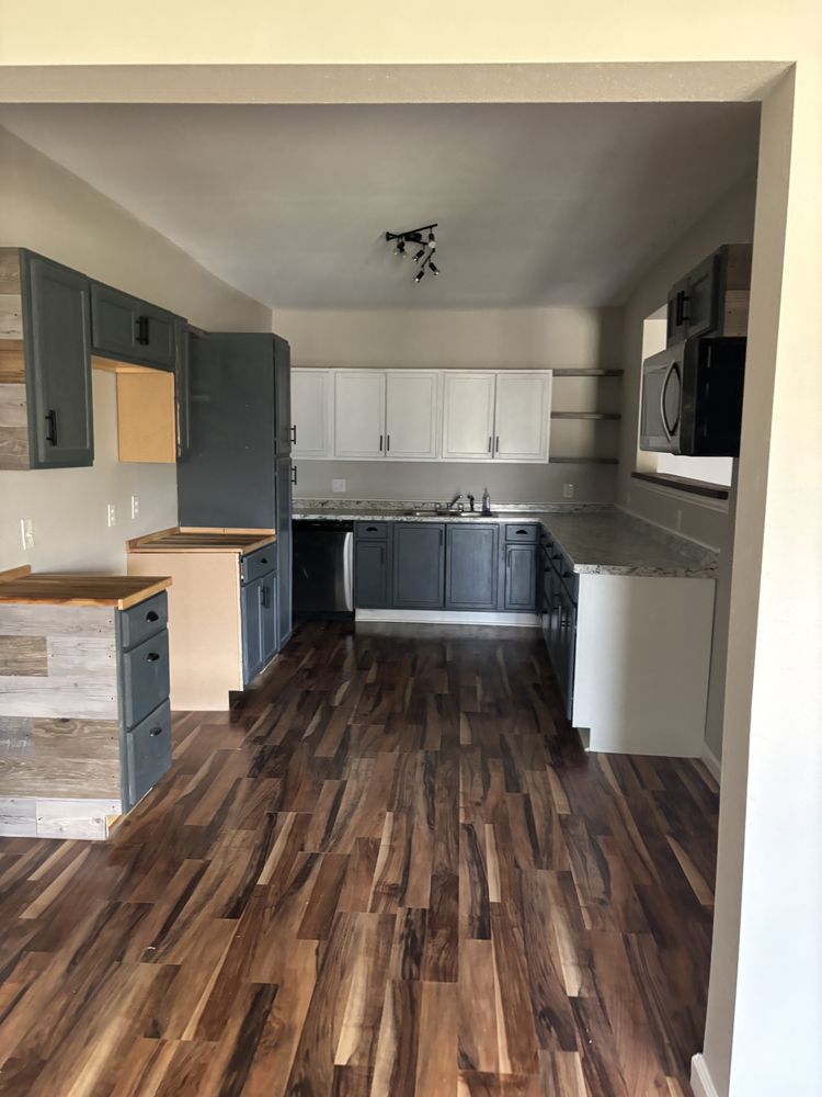 Slide of L&m roofing and construction