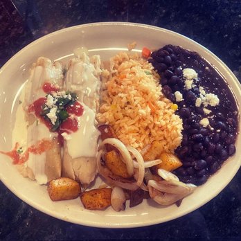 Cafe Sol - Chicken tamales, black beans and rice. - Latin American Near Me - Edmond, Oklahoma