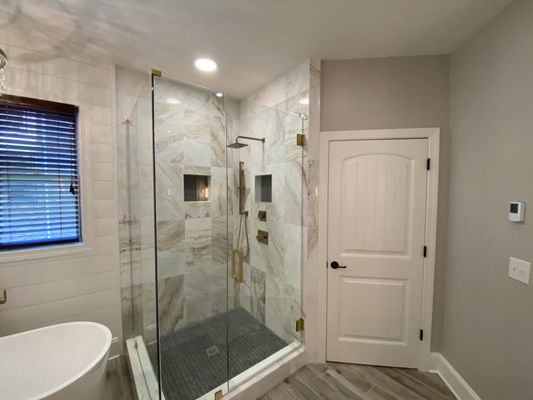 Luxury Bathroom Renovation - At Phase Construction, we recently completed a bathroom renovation that epitomizes luxury and relaxation. Our team transformed an outdated space into a spa-like retreat, featuring elegant countertops, custom cabinetry, and a spacious walk-in shower with state-of-the-art fixtures. This project showcases our commitment to quality craftsmanship and attention to detail, ensuring a serene and sophisticated environment for our client. Luxury Bathroom Renovation - At Phase Construction, we recently completed a bathroom renovation that epitomizes luxury and relaxation. Our team transformed an outdated space into a spa-like retreat, featuring elegant countertops, custom cabinetry, and a spacious walk-in shower with state-of-the-art fixtures. This project showcases our commitment to quality craftsmanship and attention to detail, ensuring a serene and sophisticated environment for our client.