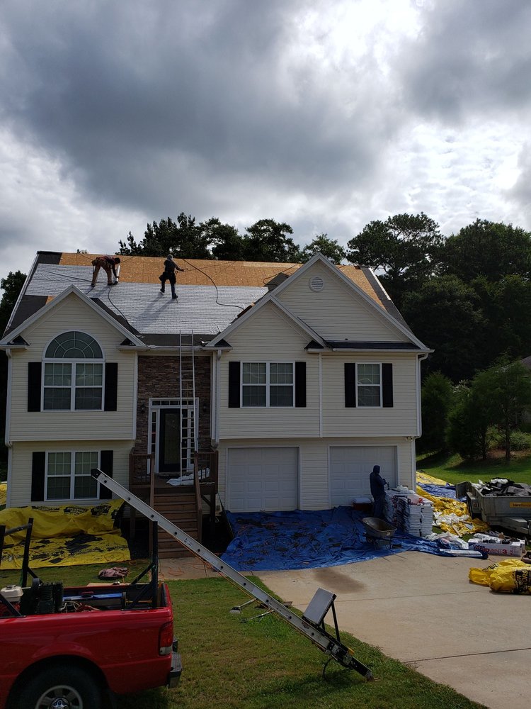 Slide of Ultimate Roofing