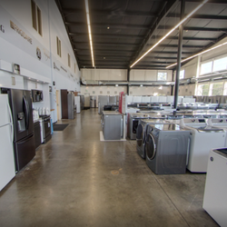 DeWaard & Bode: Outlet Store - Interior of DeWaard & Bode Appliance Store Washing Machines