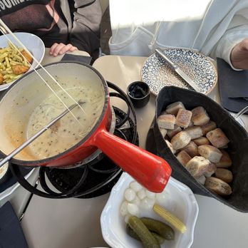 Hotel Bellevue-Pinte - Cheese fondue and dipping items. - Hotels Near Me - Grindelwald, BE