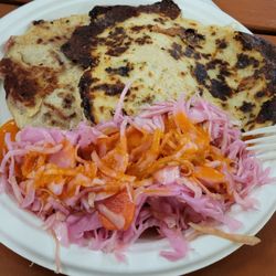Pupuseria Del Valle - Two pupusas (frijoles con queso and loroco con queso) served with curtido