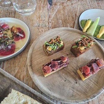 Vicia - First course: naked vegetables with pesto, crispy potatoes, duck liver mousse, cured tuna - New American Near Me - St. Louis, Missouri Vicia - First course: naked vegetables with pesto, crispy potatoes, duck liver mousse, cured tuna - New American Near Me - St. Louis, Missouri