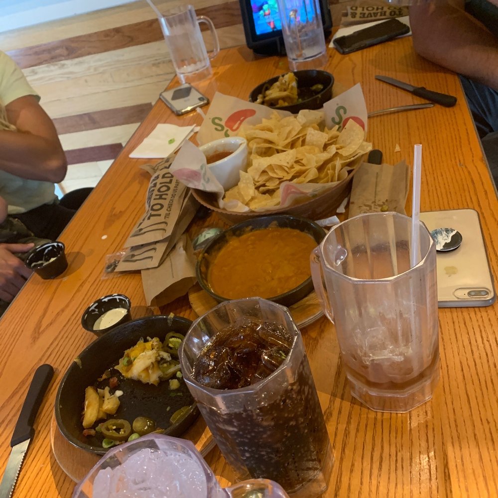 Chili's - The appetizers, chips and salsa, fries with cheese and jalapeños.  And a happy group! - American Near Me - Midvale, Utah