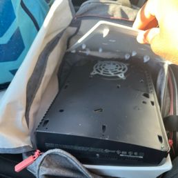 This is how I received my system back. Cover not attached and no power cable with it. This is how I received my system back. Cover not attached and no power cable with it.