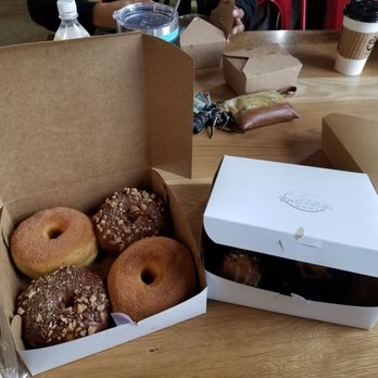 Destination Donuts - Toffee coffee, cinnamon; not pictured: peanut butter black out, birthday cake nibs - Donuts Near Me - Columbus, Ohio