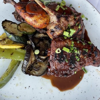 Sharx - a plate of meat and vegetables - Bars Near Me - Laval, Quebec