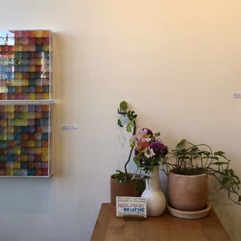 Black Bird Bookstore and Cafe - Some of the art and plants inside - Bookstores Near Me - San Francisco, California