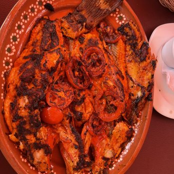 Compadres - My absolute favorite, the whole grilled fish, splayed, Tikin Xic style which is native Yucatán seasoning! To die for! - Mexican Near Me - Isla Mujeres, ROO