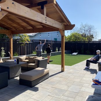 Almaden Valley Landscape - After photo. Pavers (Belgard Lafitt Grana in Victorian), seat wall, redwood Pergola - Landscaping Near Me - San Jose, California