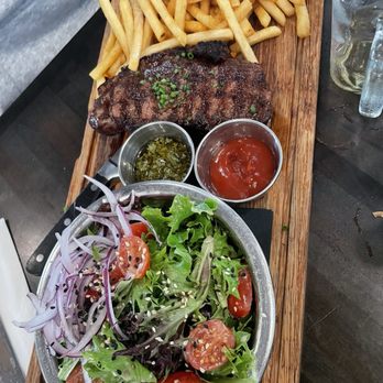 Lettuce & Tomato - Angus prime steak fillet accompanied by a fresh salad and French fries - Gastropubs Near Me - North Miami Beach, Florida