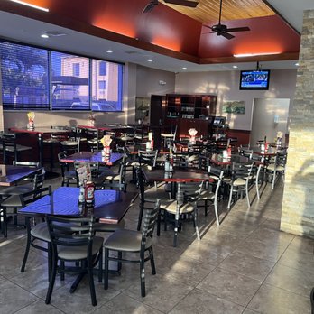 El Rinconcito Latino - tables and chairs in a restaurant - Latin American Near Me - Miami, Florida