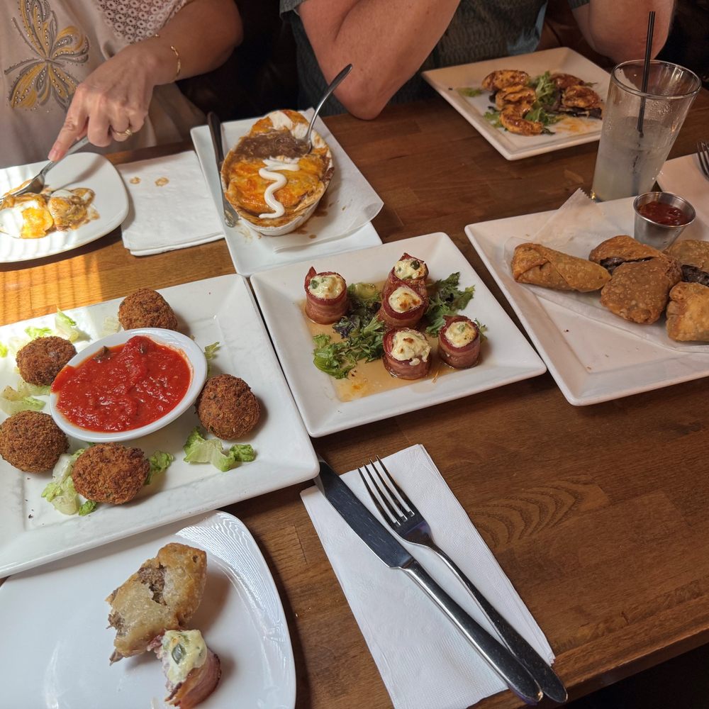 From the top, short rib pierogies, bang bang shrimp, cheese steak eggrolls, pig shots, and garlic parm cheese bombs. From the top, short rib pierogies, bang bang shrimp, cheese steak eggrolls, pig shots, and garlic parm cheese bombs.