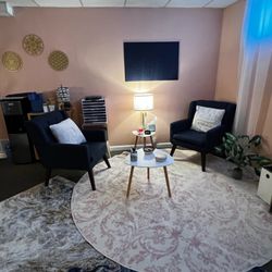 Lynne Coaching & Hypnosis - Client Seating Area: Comfortable client seating area inside Lynne Coaching & Hypnosis featuring a peaceful, relaxing atmosph...
