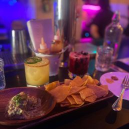 a plate of chips and a drink