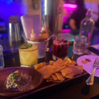 La Chingada - a plate of chips and a drink - Mexican Near Me - Toronto, Ontario