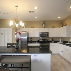Positive Latitude Villa - Updated kitchen with granite and stainless steel and huge kitchen island