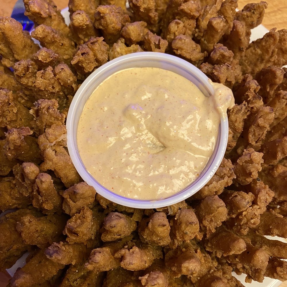 Texas Roadhouse - onion appetizer - our sauce had a clump of some foreign object in it and we had to get it replaced .. not the most "appetizing" - Steakhouses Near Me - Austin, Texas Texas Roadhouse - onion appetizer - our sauce had a clump of some foreign object in it and we had to get it replaced .. not the most "appetizing" - Steakhouses Near Me - Austin, Texas