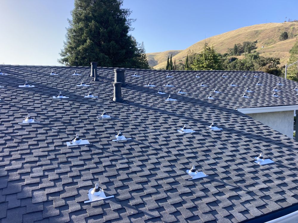 Slide of Mel's Roofing