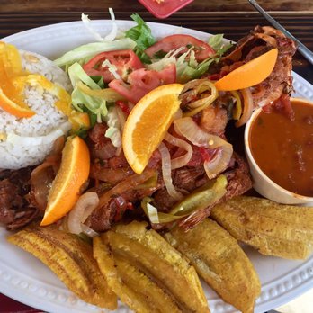 Rancho Choli - Fresh red snapper with criollo sauce and tostones - Latin American Near Me - Vieques, Puerto Rico Rancho Choli - Fresh red snapper with criollo sauce and tostones - Latin American Near Me - Vieques, Puerto Rico