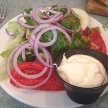 SKD Kitchen And Drinks - Great salad with Run around Sue playing in the background - Pizza Near Me - Saint Pete Beach, Florida SKD Kitchen And Drinks - Great salad with Run around Sue playing in the background - Pizza Near Me - Saint Pete Beach, Florida