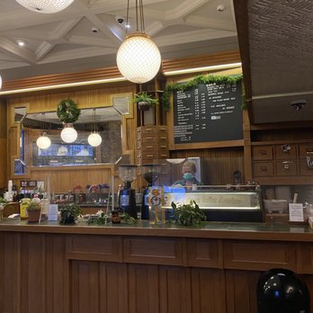 Stumptown Coffee Roasters - Coffee bar and espresso machine. Lights, menu on the wall, employees are masked. - Coffee & Tea Near Me - New York, New York